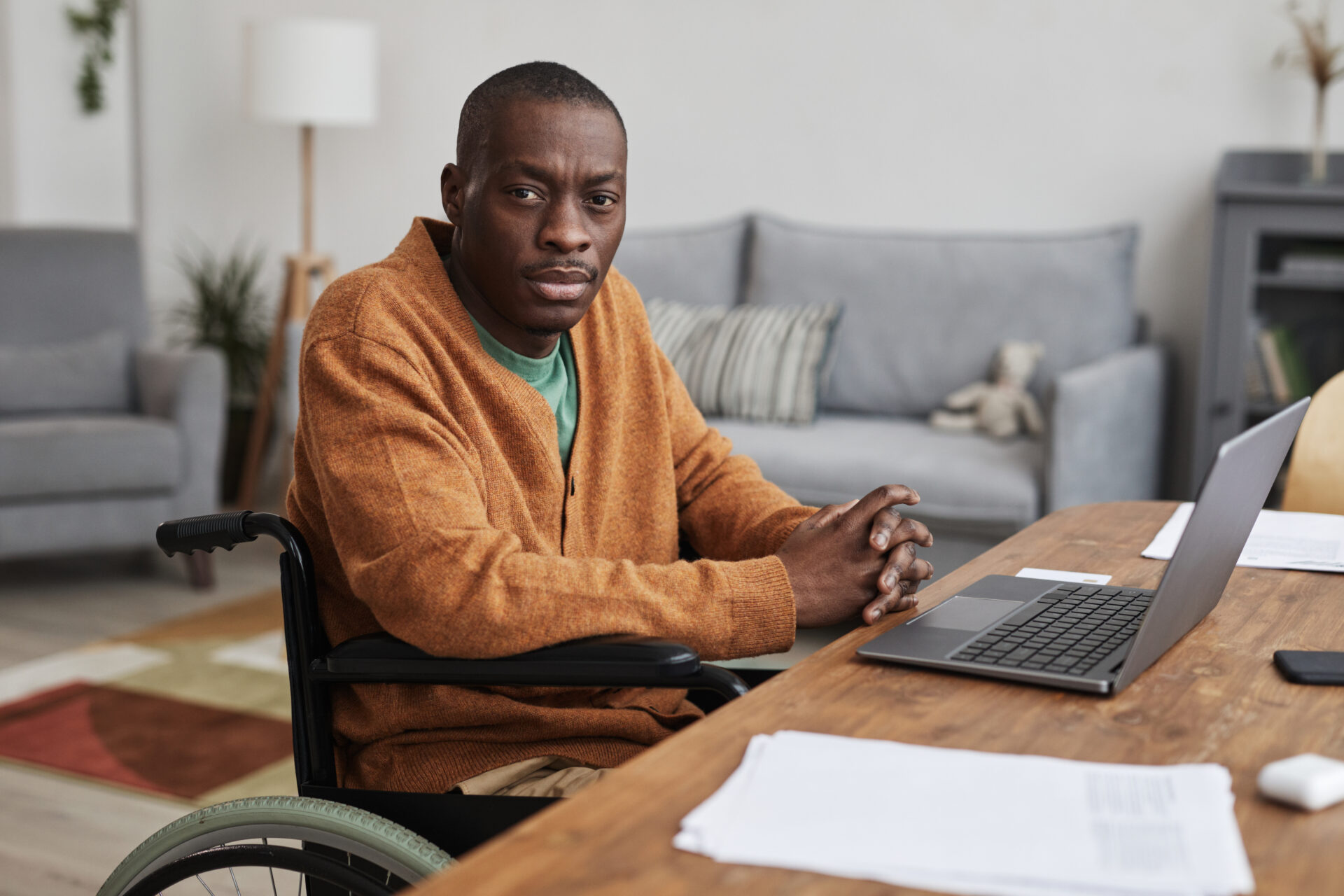 Portrait,Of,Adult,African-american,Man,Using,Wheelchair,While,Working,From